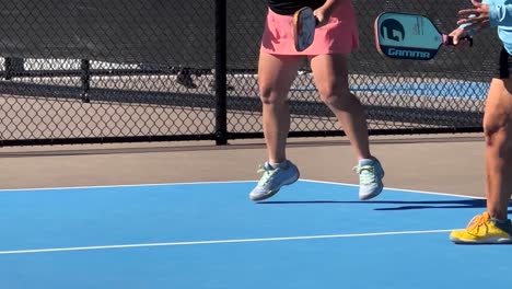 Close-Up-Of-Pickleball-Players-Swinging-Paddle-To-Hit-Opponent-Balls-In-Competition