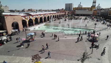 Aerial-view-of-people-walking-in-the-main-garden-of-irapuato-dancing-fountains