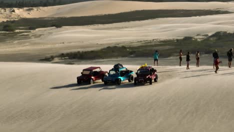 Friends,-Off-road-4x4-Enjoying-on-the-Desert-Dunes-Beach-of-Brazil-Jericoacoara-Sand-Drive-Adventure,-Sports-Vehicle,-Aerial-Shot