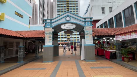 People-walk-around-the-neighbourhood-of-Toa-Payoh-Mall-in-Singapore