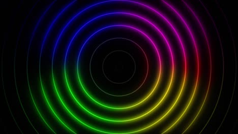 Abstract-seamless-loop-neon-four-colours-gradient-concentric-circle-on-a-black-background