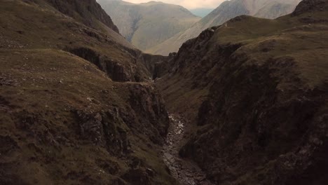 Spectacular-drone-flight-above-the-canyon-and-river-in-Lake-District,-United-Kingdom