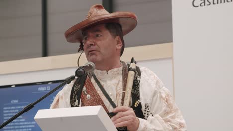 Folkloric-male,-dressed-in-traditional-clothes,-Castilla-y-Leon,-at-FITUR,-Madrid-Spain