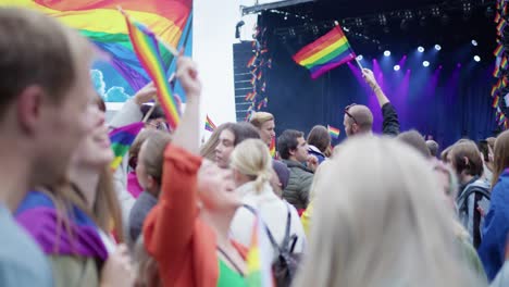Crowd-level-view-of-Oslo-Pride-2022-people-with-rainbow-flags