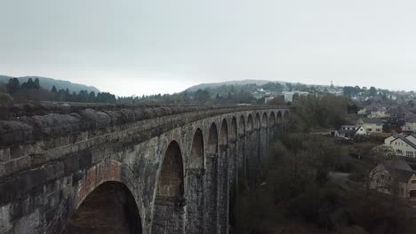 Drone-captures-very-old-brick-viaduct-with-arcs-in-Wales