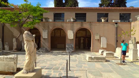Marble-Statues-of-Ancient-Corinth-in-Courtyard-of-Museum