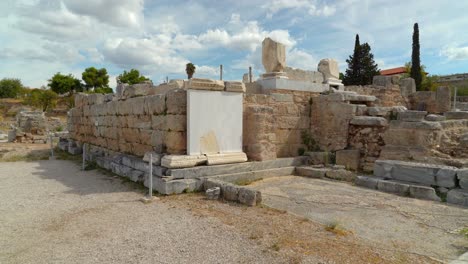 People-Standing-on-the-Top-of-Bema-of-Saint-Paul-in-City-of-Ancient-Corinth