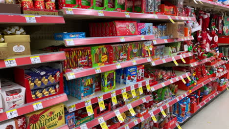 Christmas-Aisle-at-Walgreens-with-colorful-holiday-candy,-stockings,-lights