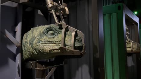 Animatronic-Velociraptor-Dinosaurs-Caged-And-Muzzled-at-Jurassic-World-The-Exhibition