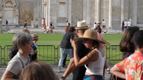 People-Posing-in-Front-of-the-Leaning-Tower-of-Pisa-on-the-Piazza-del-Duomo