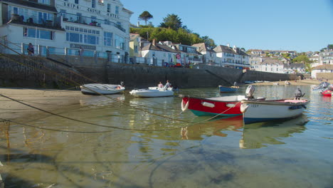 Docked-Wooden-Boats-In-St-Mawes-Village-Near-Falmouth-Harbour,-Cornwall,-United-Kingdom