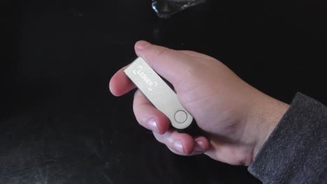 Holding-hardware-wallet-for-crypto-in-hand