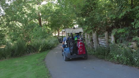 smooth-golfing-path-and-golfer-riding-by-in-carts-waving