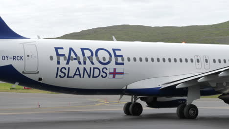 Close-Up-Engine-and-Wing-of-Faroe-Islands-Airplane-Beginning-to-Taxi