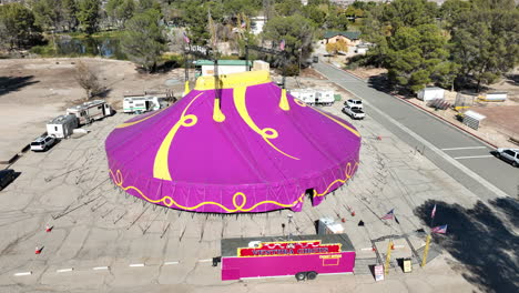 Ventura-Circus-big-top-tent---pull-back-aerial-view-to-reveal-the-setting-of-California-City,-California