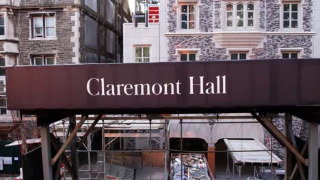 Aerial-view-of-the-Claremont-Hall-sign,-evening-in-Morningside-Heights,-NYC,-USA