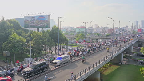 Busy-cars-with-traffic-jam-in-the-rush-hour-on-highway-road-street-on-central-bridge-in-Ho-Chi-Minh-Downtown,-urban-city-in-Asia,-Vietnam