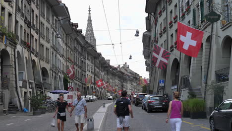 People-Walking-on-Main-Street-in-Old-Town-Bern,-Historical-City-Center
