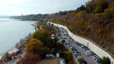 Aerial-Drone-Fly-Above-Black-Sea-Summer-Coast,-Alley-at-Beach-in-Varna,-Bulgaria-Tourism-Panorama