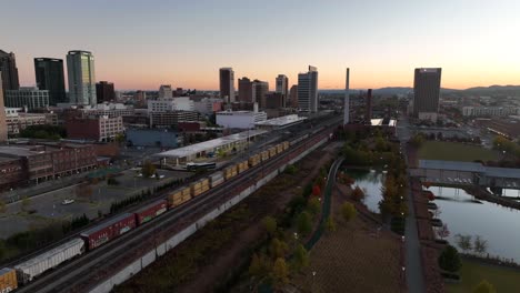Railroad-train-and-Birmingham-Alabama-skyline-at-dawn