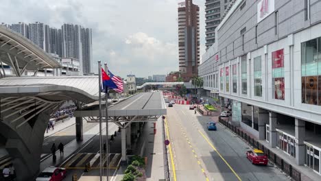 Street-view-between-Customs,-Immigration-and-Quarantine-Complex-and-City-Square-Mall-in-Johor-Bahru,-Malaysia