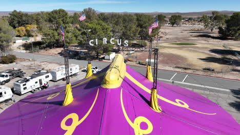 Pull-back-aerial-reveal-of-the-Ventura-Circus-big-top-tent-in-California-City