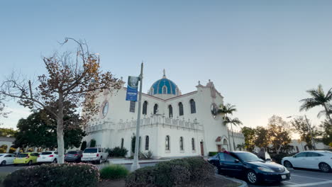 The-Immaculata-church-of-University-of-San-Diego,-wide-shot-with-parking-area