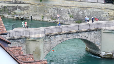 Local-Man-Jumping-From-Bridge-in-Aare-River-in-Bern-to-Commute