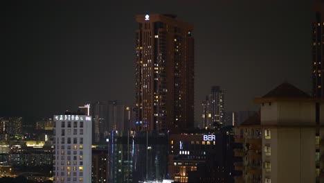 Nightscape-view-of-Berjaya-Times-Square,-Hotel-Capitol-and-buildings-nearby,-Kuala-Lumpur-skyline-,-Malaysia