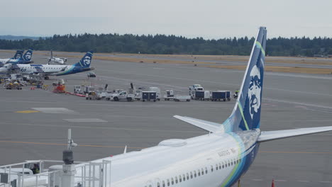 Aerial-shot-of-Alaska-airline-airplane-standing-in-the-airport