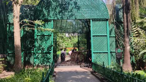 Ancient-cannon,-firing-iron-cores-in-the-beautiful-iron-cage-at-Victoria-Garden-or-Rani-Baug-Byculla-zoo-Mumbai-Old-weapon-on-historical-festival-Times