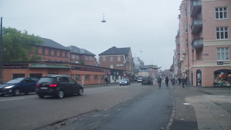 Amagerbrogade-in-Copenhagen-Denmark-on-a-cold,-wet-and-overcast-day