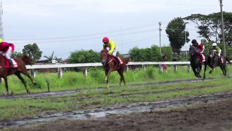 Indonesia---Nov-27,-2022-:-Group-of-jockey-practice-to-horse-racing-at-the-racetrack