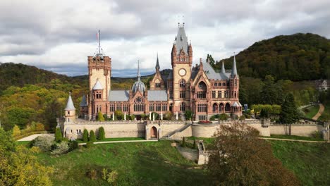 Drachenburg-Castle-situated-in-the-Drachenfels,-Königswinter,-Germany-with-a-beautiful-autumn-sun-and-coloured-leaves