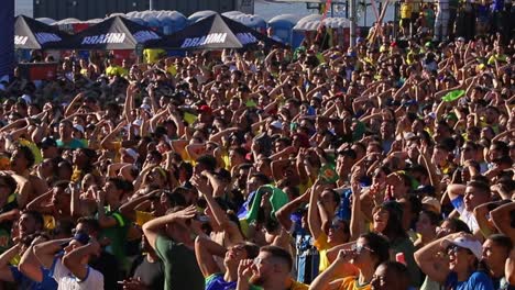 fotball-fans-watching-the-match-Brazil-x-Croatia-on-the-fun-fest-in-Brasilia-city-of-Porto-Alegre