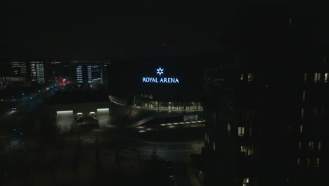 Revealing-illuminated-Royal-Arena-Stadium-in-the-evening
