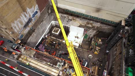 Foundation-work-at-a-construction-site-in-Midtown,-Manhattan,-NYC---Aerial-view