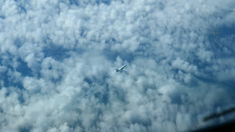 Air-To-Air-Shot-Of-Transavia-Boeing-737-Flying-In-Sunny-Blue-Sky-With-White-Clouds