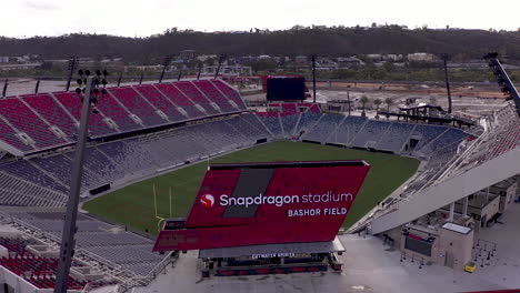Snapdragon-Stadium-Bashor-Field-sign,-drone-dolly-shot
