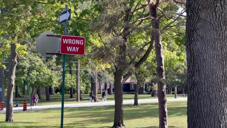 Wrong-Way-signage-gives-directions-inside-High-Park-woodland