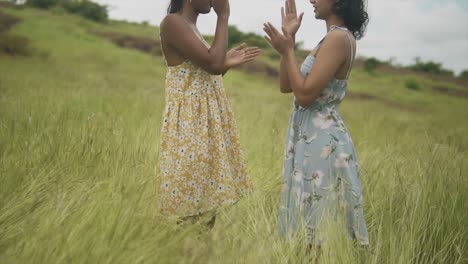 Two-Playful-Indian-models-in-the-rural-Field