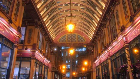 Illuminated-Covered-Market-And-Tourist-Attraction-At-Leadenhall-Market-In-The-City-of-London,-United-Kingdom