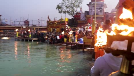 holy-ganges-river-evening-aarti-with-devotee-gathered-for-pryer-video-is-taken-at-har-ki-pauri-haridwar-uttrakhand-india-on-Mar-15-2022