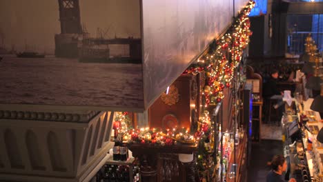 Beautiful-interior-decoration-during-Christmas-season-in-Horniman-pub-in-Hay's-Galleria-in-London,-UK