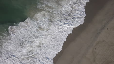 Drone-head-shot-of-Waves-Crashing-offshore