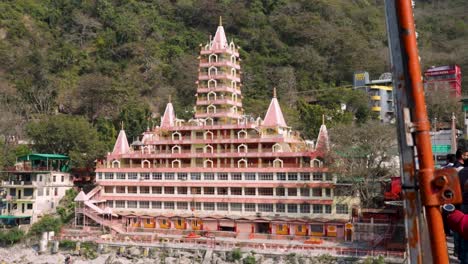 ancient-hindu-temple-multistory-at-day-from-flat-angle-video-is-taken-at-trimbakeshwar-temple-lakshman-jhula-rishikesh-uttrakhand-india-on-Mar-15-2022