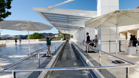 Visitors-of-the-Getty-museum-wait-for-the-Getty-Center-tram-at-the-train-station