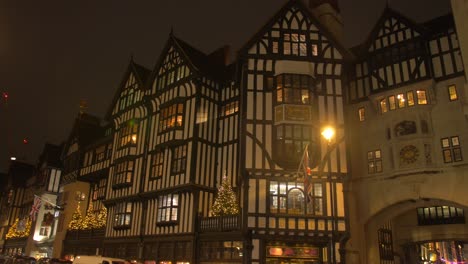 Tudor-Revival-Building-Of-Liberty-Luxury-Department-Store-At-Night-During-Christmas-Season-In-London,-UK