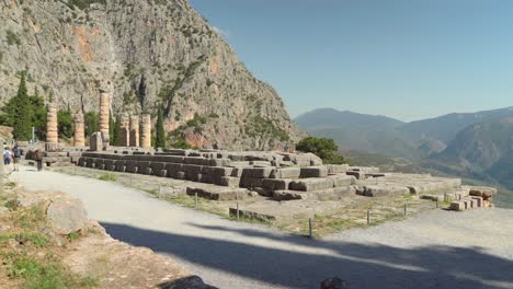 Walking-Near-Temple-of-Apollo-in-Delphi-Archaeological-Site