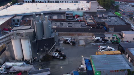 Aerial-View-of-Concrete-Ready-Mix-Plant-and-Heavy-Mixer-Trucks